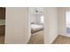 Clean bedroom featuring a ceiling fan and wood flooring at 5015 Us Highway 19 # 503, New Port Richey, FL 34652