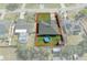 Aerial view of property lines, featuring a well-maintained yard and an above-ground pool enclosed by a white privacy fence at 5139 Jenson Ave, Spring Hill, FL 34608