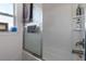 Bright bathroom with a shower and window at 5139 Jenson Ave, Spring Hill, FL 34608