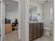 Bathroom featuring granite countertops and tiled floors at 5139 Jenson Ave, Spring Hill, FL 34608
