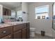 Bathroom with a granite countertop vanity and tiled floors at 5139 Jenson Ave, Spring Hill, FL 34608