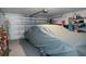 Garage with storage and a covered car at 5139 Jenson Ave, Spring Hill, FL 34608