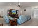 Cozy living room with a vaulted ceiling, carpet flooring, and stylish furnishings at 5139 Jenson Ave, Spring Hill, FL 34608