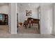 Elegant living room featuring a grand piano and stylish decor for sophisticated living at 5139 Jenson Ave, Spring Hill, FL 34608
