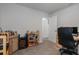 Carpeted office with ample shelving at 5139 Jenson Ave, Spring Hill, FL 34608