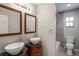 This bathroom features a double sink vanity with a unique vessel sink design and a shower and toilet area at 5345 Carlton Rd, New Port Richey, FL 34652