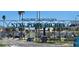 Welcome to the Historic Downtown New Port Richey archway, surrounded by palm trees and local businesses at 5800 Massachusetts Ave, New Port Richey, FL 34652
