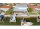 Waterfront property with docks and a serene canal view with nearby access to the ocean at 6228 Lonnie Lee Ln, Hudson, FL 34667