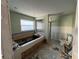 Bathroom in need of remodeling featuring a tub, shower and toilet at 6228 Lonnie Lee Ln, Hudson, FL 34667