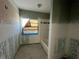 Bathroom with shower-tub combination and window, needs finishing touches at 6228 Lonnie Lee Ln, Hudson, FL 34667