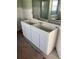 Bathroom with double vanity and modern sink basin, ready for finishing touches and customization at 6228 Lonnie Lee Ln, Hudson, FL 34667