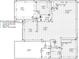 A detailed floor plan showcasing the layout and dimensions of the main bedroom, kitchen, living room, and garage at 6228 Lonnie Lee Ln, Hudson, FL 34667