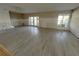 Spacious living room boasts tile floors, plenty of natural light, and an open floor plan at 6228 Lonnie Lee Ln, Hudson, FL 34667