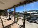 View from the screened porch showcasing the boat dock and water access at 6228 Lonnie Lee Ln, Hudson, FL 34667