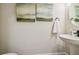 Stylish powder room featuring modern fixtures and decor at 6470 Summit View Dr, Brooksville, FL 34601