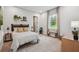 A cozy bedroom with carpet flooring, simple decor, and an inviting, relaxed ambiance at 6470 Summit View Dr, Brooksville, FL 34601
