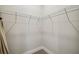 Empty walk-in closet with carpet flooring and metal shelving at 6470 Summit View Dr, Brooksville, FL 34601