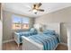 Twin bedroom with nautical themes, wood floors and bright natural light at 6800 Sunset Way # 1006, St Pete Beach, FL 33706