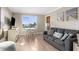 Comfortable living room with a view, featuring modern decor and ample natural light at 6800 Sunset Way # 1006, St Pete Beach, FL 33706