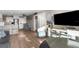 Spacious living room with an open layout, featuring a modern kitchen and comfortable seating area at 6800 Sunset Way # 1006, St Pete Beach, FL 33706