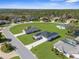 Panoramic aerial view of a residential neighborhood with homes, streets, and green spaces at 8338 Maybelle Dr, Weeki Wachee, FL 34613