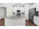 Beautiful kitchen with stainless steel appliances and granite countertops at 8338 Maybelle Dr, Weeki Wachee, FL 34613