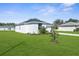 View of the home and its green, spacious lawn showing great outdoor space at 8338 Maybelle Dr, Weeki Wachee, FL 34613