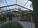View from inside pool area looking out to the house at 8526 Delaware Dr, Weeki Wachee, FL 34607