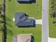 Aerial view of a home showcasing its layout and surrounding landscape at 8828 Mississippi Run, Weeki Wachee, FL 34613
