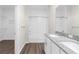Bathroom featuring double sink vanity and tiled shower/tub combo at 8828 Mississippi Run, Weeki Wachee, FL 34613