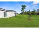 Large backyard with green grass and plenty of space at 9062 Wade St, Brooksville, FL 34613