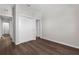 Neutral bedroom featuring a large closet, overhead lighting, and hard floors at 9062 Wade St, Brooksville, FL 34613