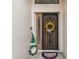 A welcoming front door featuring holiday decorations and a charming gnome sign at 9336 Creekside Ct, Hudson, FL 34669