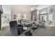 Comfortable living room with vaulted ceilings, modern furniture, and natural light at 9336 Creekside Ct, Hudson, FL 34669