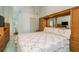 Spacious bedroom features a built in wardrobe, plush carpeting, and lots of natural light at 9405 Palm Haven Ct, New Port Richey, FL 34655