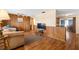 Comfortable living room with wood paneling and lots of natural light at 10736 Queens Rd, Port Richey, FL 34668