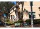 Charming townhome exterior with well-maintained landscaping, showcasing a welcoming community environment at 10936 Keys Gate Dr, Riverview, FL 33579
