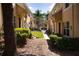 Townhome exteriors with well-maintained landscaping creating inviting curb appeal at 10936 Keys Gate Dr, Riverview, FL 33579