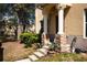 Inviting front porch with stone accents and decorative columns at 10936 Keys Gate Dr, Riverview, FL 33579