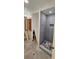 Bathroom renovation in progress, showing tiled shower walls and space for vanity at 11617 Duda Rd, Hudson, FL 34667