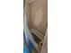 Simple shower tub with neutral tile and a shower curtain at 11617 Duda Rd, Hudson, FL 34667