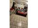 Bedroom with tile flooring and a window at 11617 Duda Rd, Hudson, FL 34667