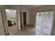 Bedroom features include a bathroom, closet, and sliding glass door at 11617 Duda Rd, Hudson, FL 34667