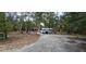 Ranch style home with a long drive and mature trees at 11617 Duda Rd, Hudson, FL 34667