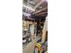 Image of a cluttered garage interior, showcasing ample storage potential and workspace at 11617 Duda Rd, Hudson, FL 34667