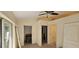 Room in the process of renovations with multiple doorways at 11617 Duda Rd, Hudson, FL 34667