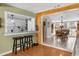 Kitchen with breakfast bar open to dining and living areas for easy entertaining and Gathering time at 12511 Stone House Loop, Hudson, FL 34667