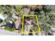 An aerial view with a yellow outline highlighting the property and surrounding landscape at 12724 Circle Lake Dr, Hudson, FL 34669