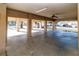 Spacious carport underneath a raised home, providing ample covered parking and storage space at 12724 Circle Lake Dr, Hudson, FL 34669
