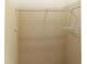 Walk-in closet featuring ample shelving, ideal for organization and storage solutions at 12724 Circle Lake Dr, Hudson, FL 34669